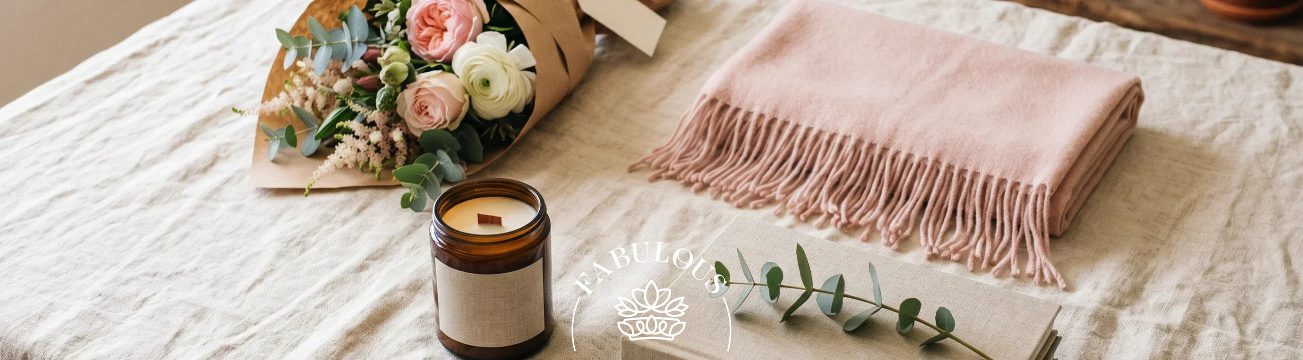 The 4 gift rule for birthdays explained with bouquet candle scarf and books flat lay by Fabulous Flowers Cape Town