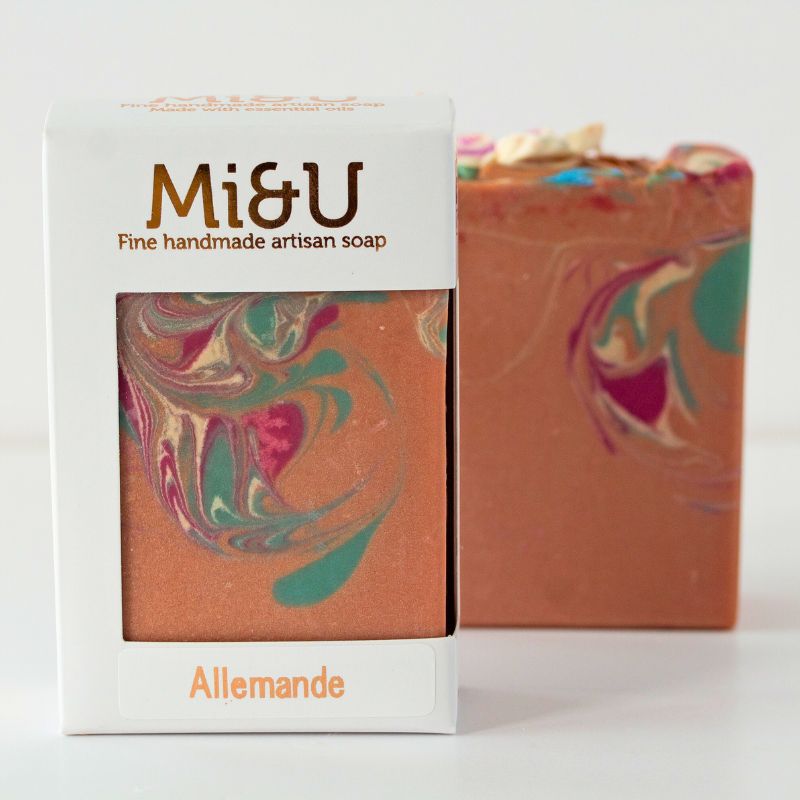Mi&U fine handmade artisan soap with marbled design and visible branding.