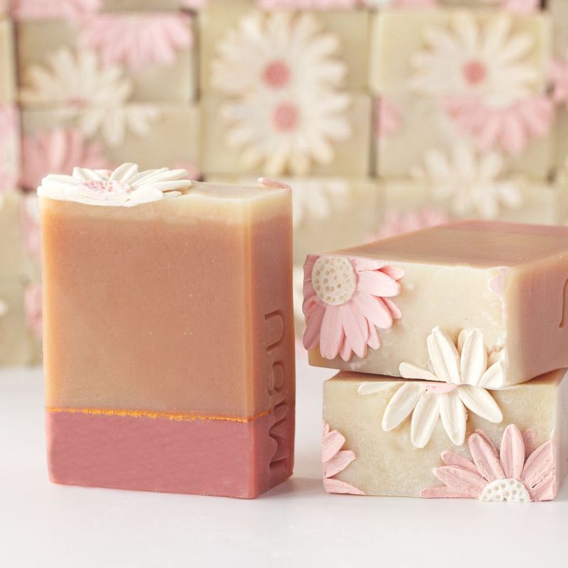 Allemande Soap in Mi&U packaging featuring elegant marble swirls in earthy pink and green.