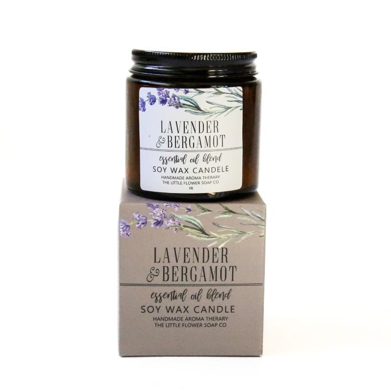 Lavender and Bergamot candle with packaging on a white background