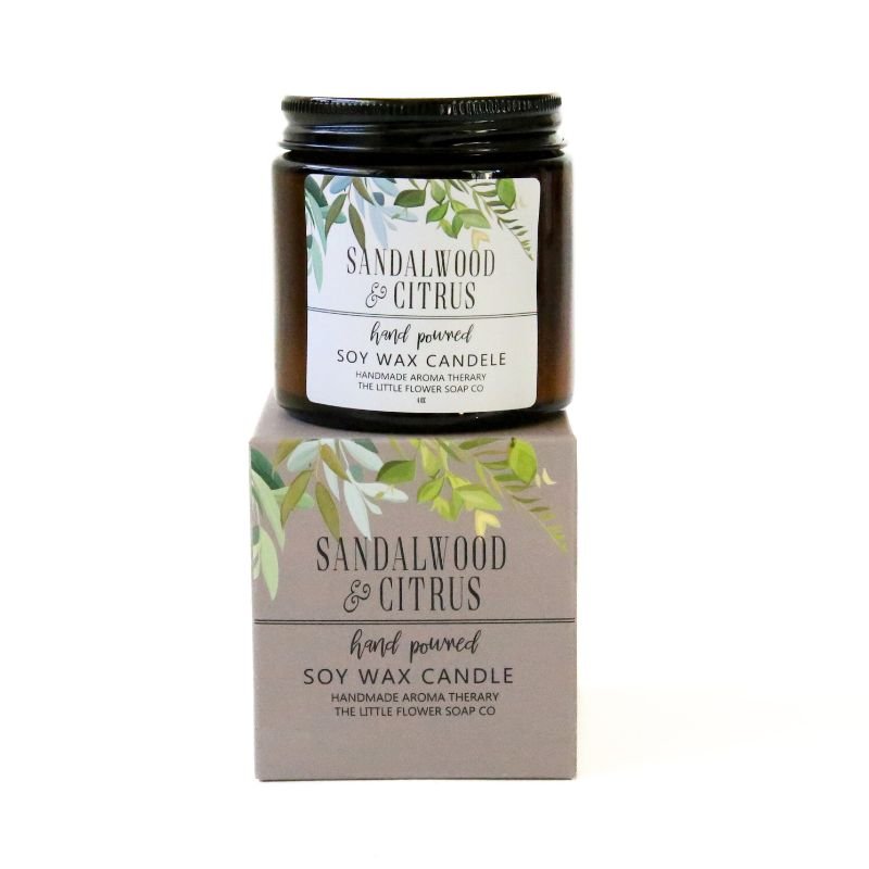 Sandalwood & Citrus candle with packaging on a white background