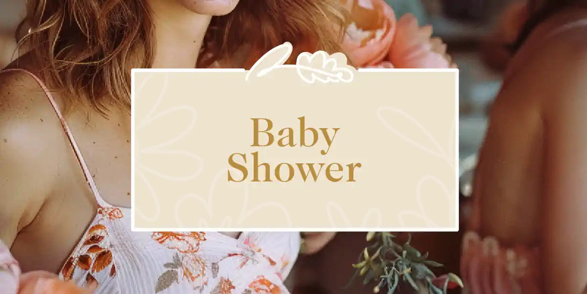 Baby Shower: Woman in Floral Dress Holding a Beautiful Bouquet of Flowers, Celebrating a Baby Shower with Friends. Perfect for the Occasion. Fabulous Flowers and Gifts.