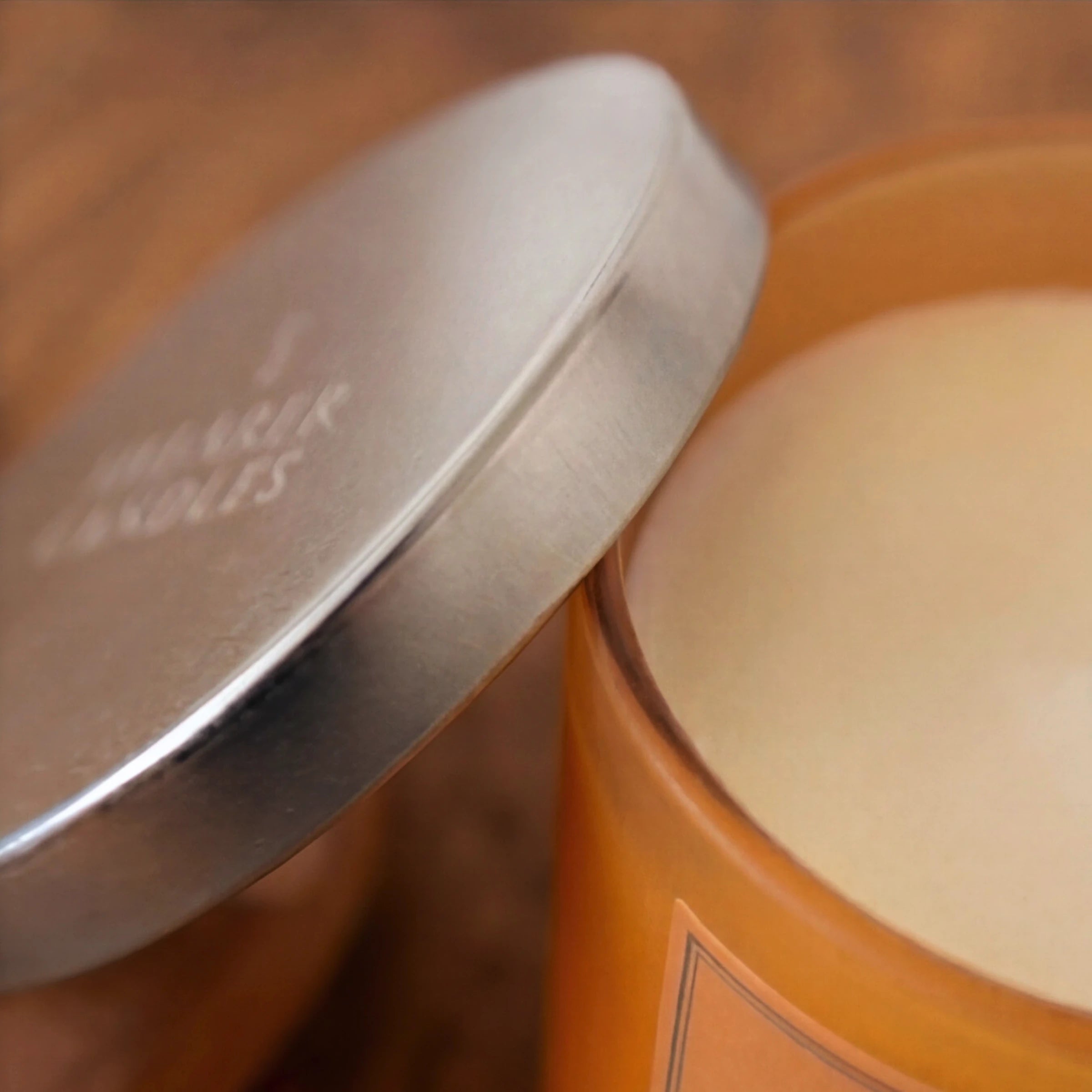Close-up of the Shearer Candles Amber & Rose candle from the Bloom & Glow flowers and candle gift set