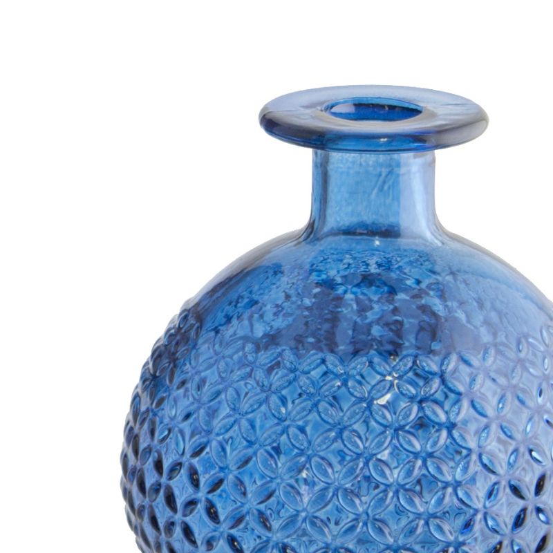 Blue textured vase on a white background