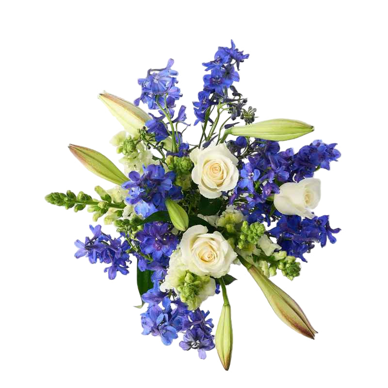 Top view of the Blue Sapphire flower arrangement, showcasing white roses, blue delphiniums, and unopened lilies in a clear glass jar.
