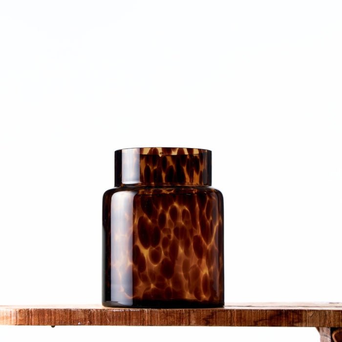 Stunning Caramel Ripple Glass Vase showcasing unique ripple patterns in warm amber tones, perfect for elegant floral displays.