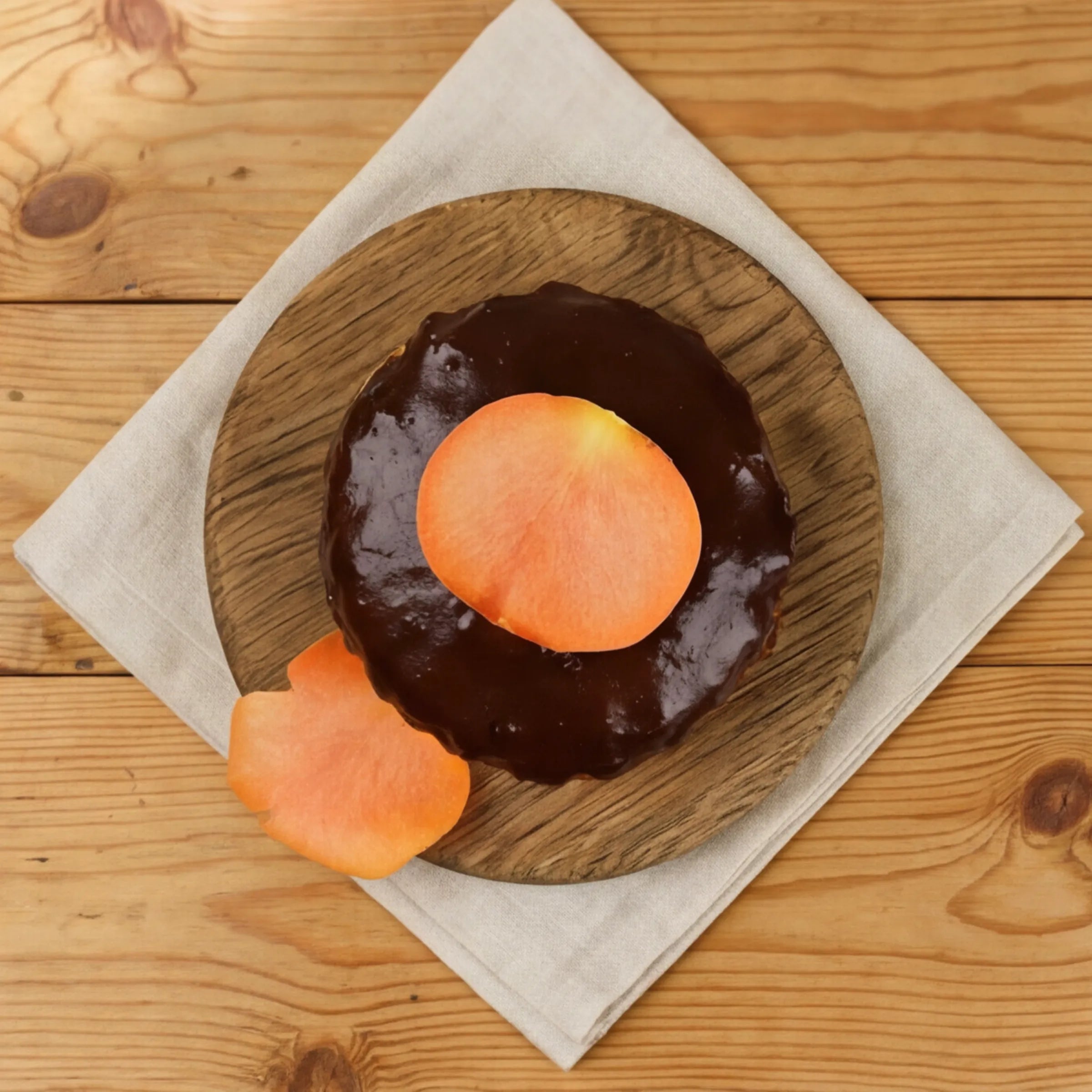 Top-down gluten-free chocolate orange cake with thick chocolate ganache, hand-made in Claremont