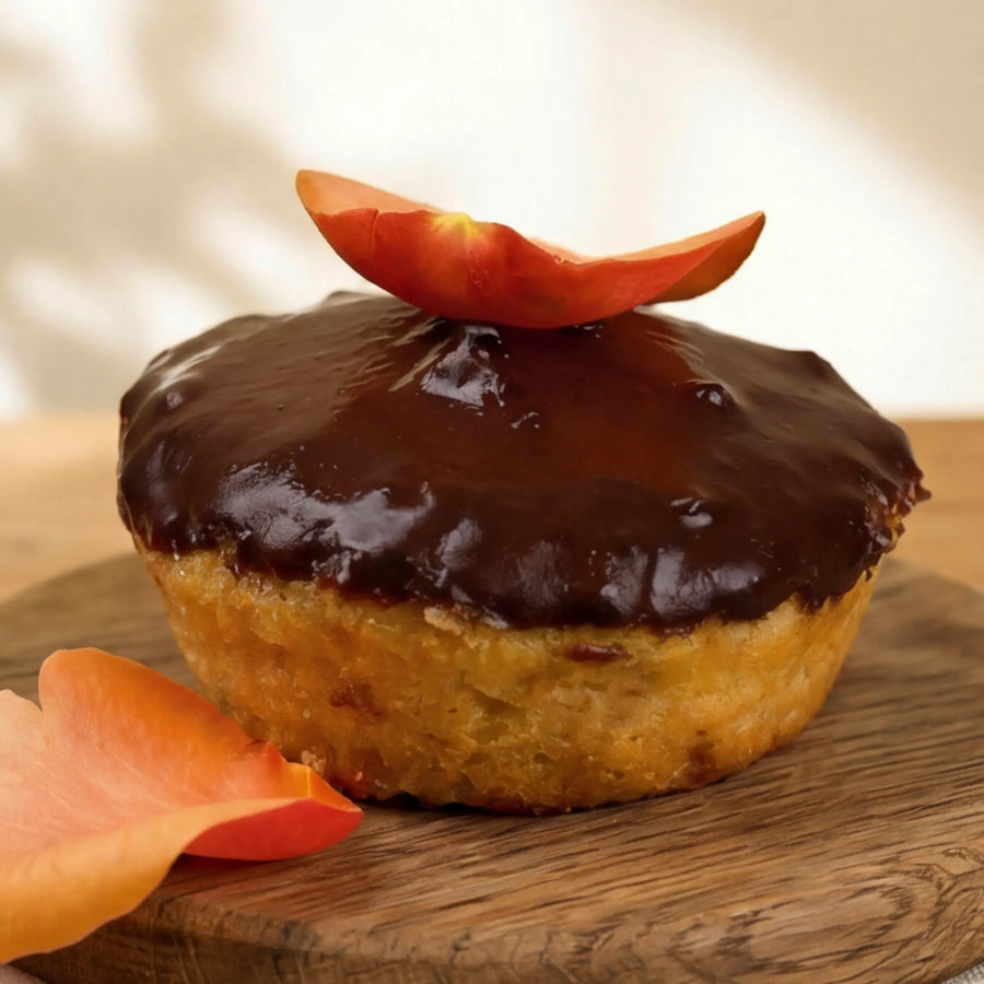 Side view of GF chocolate orange cake showing citrus crumb and dark glaze, by Fabulous Flowers