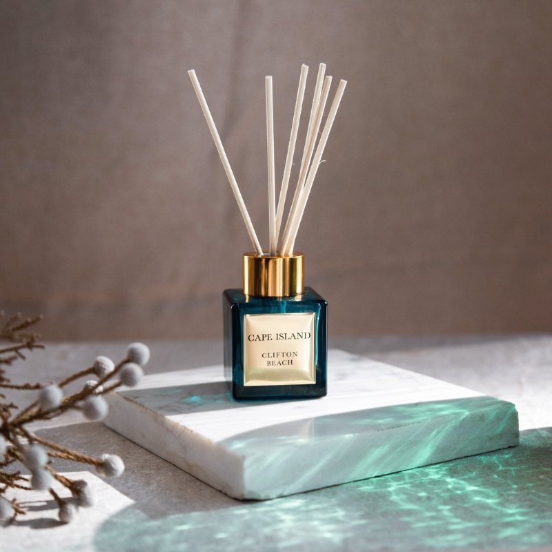 Cape Island diffuser on a marble surface with a neutral background