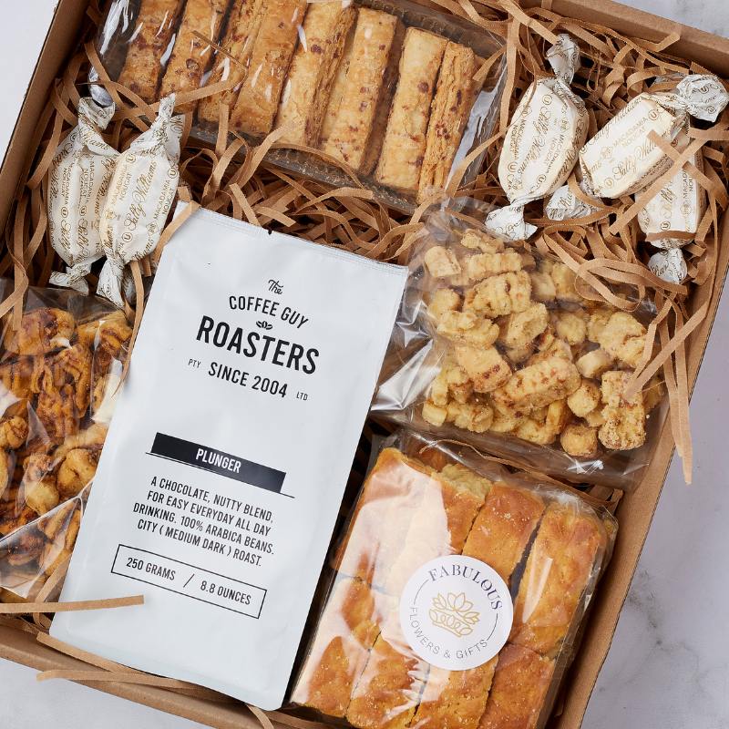Comfort and Coffee: A perfect blend of premium coffee and delicious treats, ideal for cosy moments or gifting from Fabulous Flowers & Gifts.