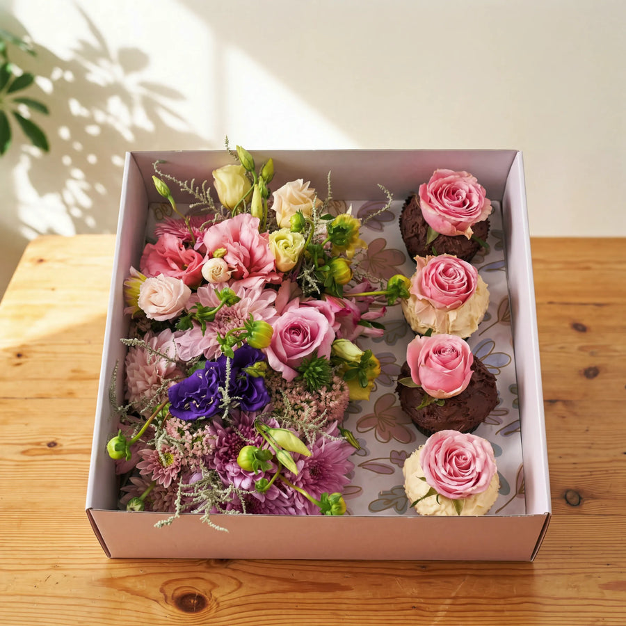 Cupcake Bloom Box with pink roses and chocolate cupcakes topped with fresh roses by Fabulous Flowers Cape Town