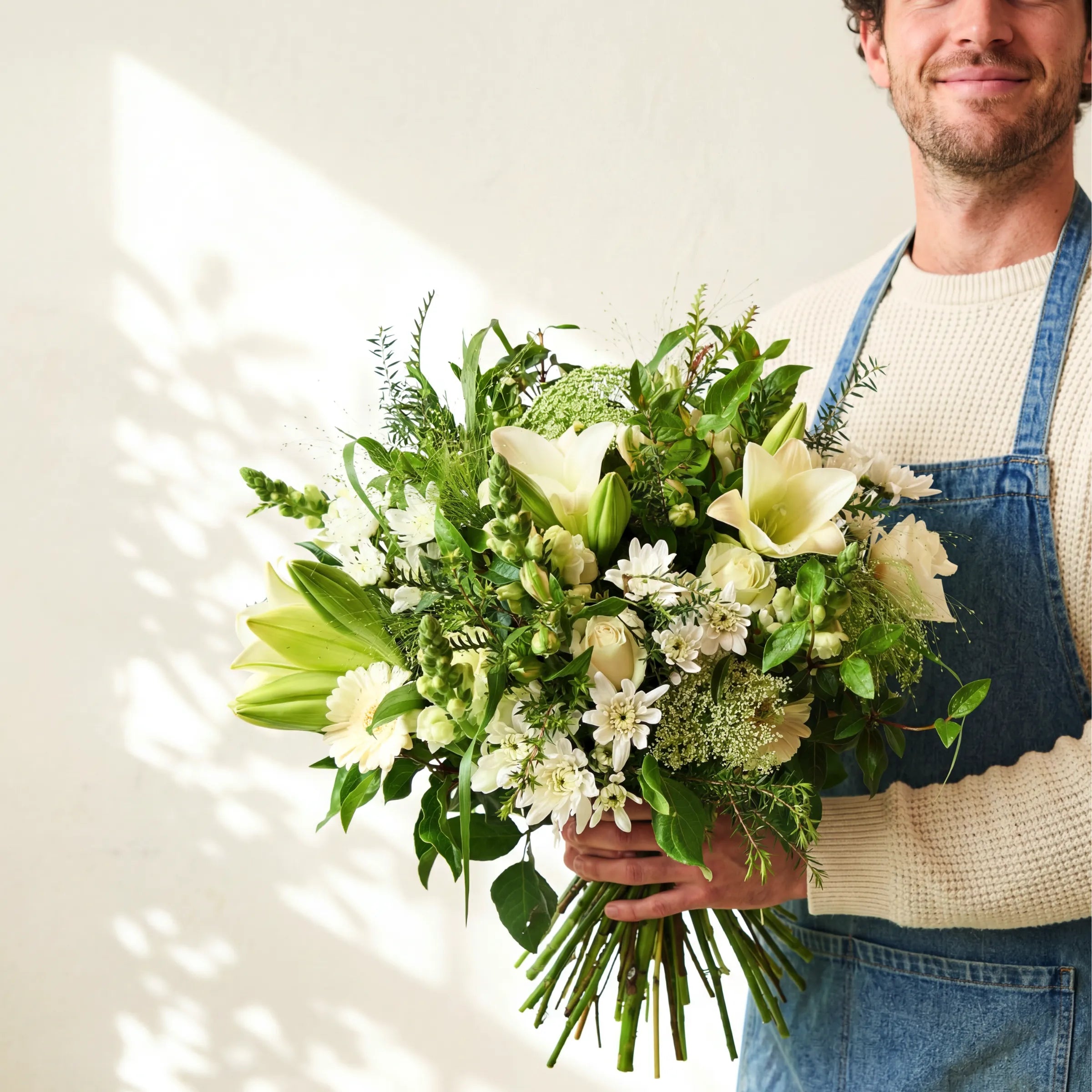 White and green Elegant White Bouquet of lilies, roses, gerberas and snapdragons by Fabulous Flowers Cape Town