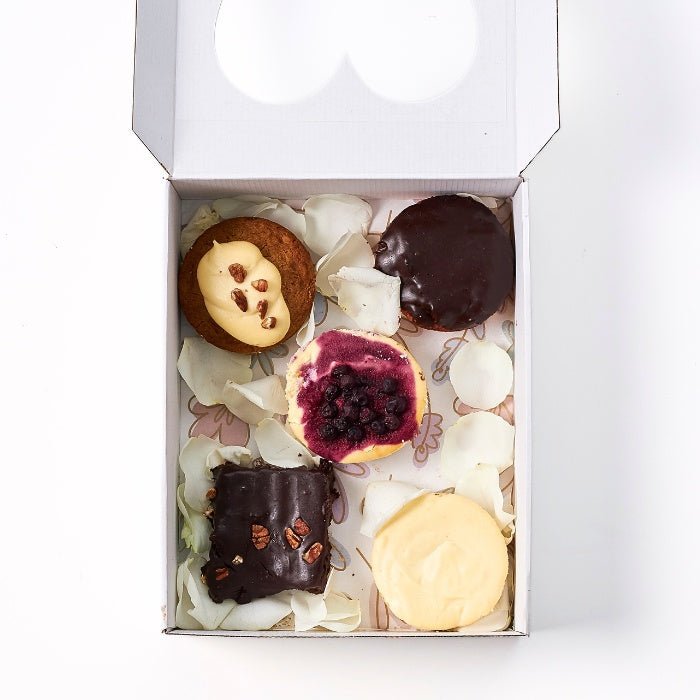 From Me, With Butter - Fabulous Flowers & Gifts dessert box with five assorted baked treats on petals in a white box.