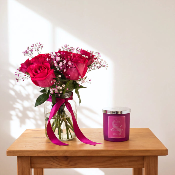 Fuchsia Flame hot pink roses with pink baby's breath and Tropical Watermelon candle