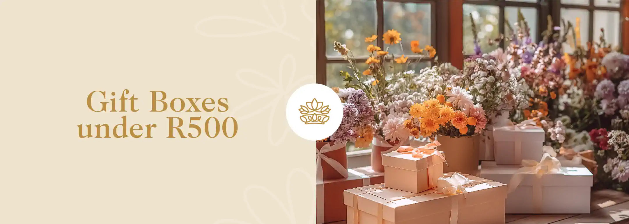 A variety of gift boxes under R500 creatively arranged with stunning floral decorations around. Fabulous Flowers and Gifts - Gift Boxes under R500