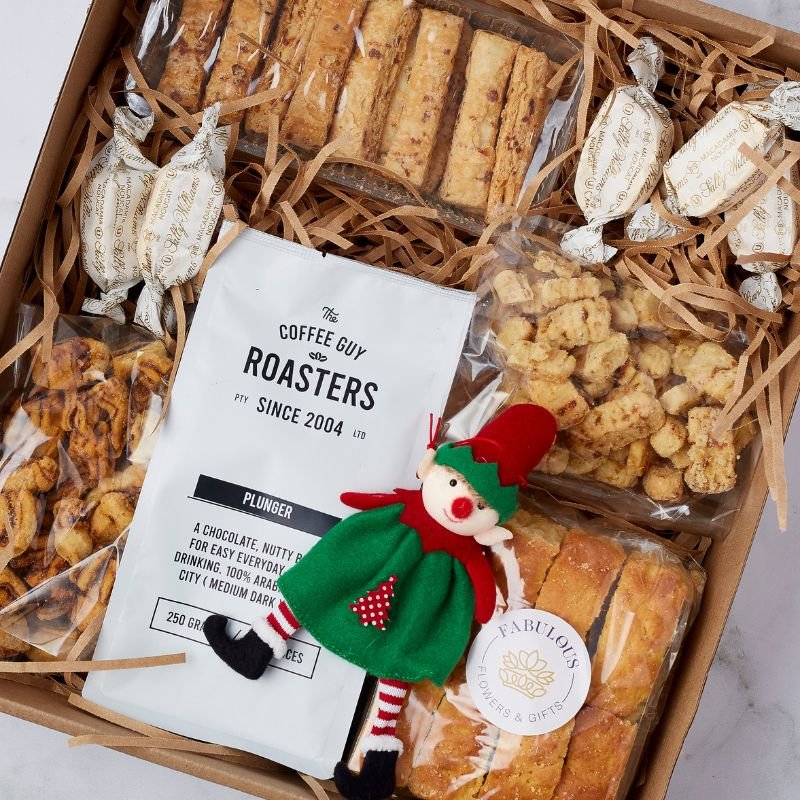 Festive coffee Delight Gift Box with Coffee Guy Roasters coffee, Ouma rusks, a coffee plunger, and a festive elf ornament.