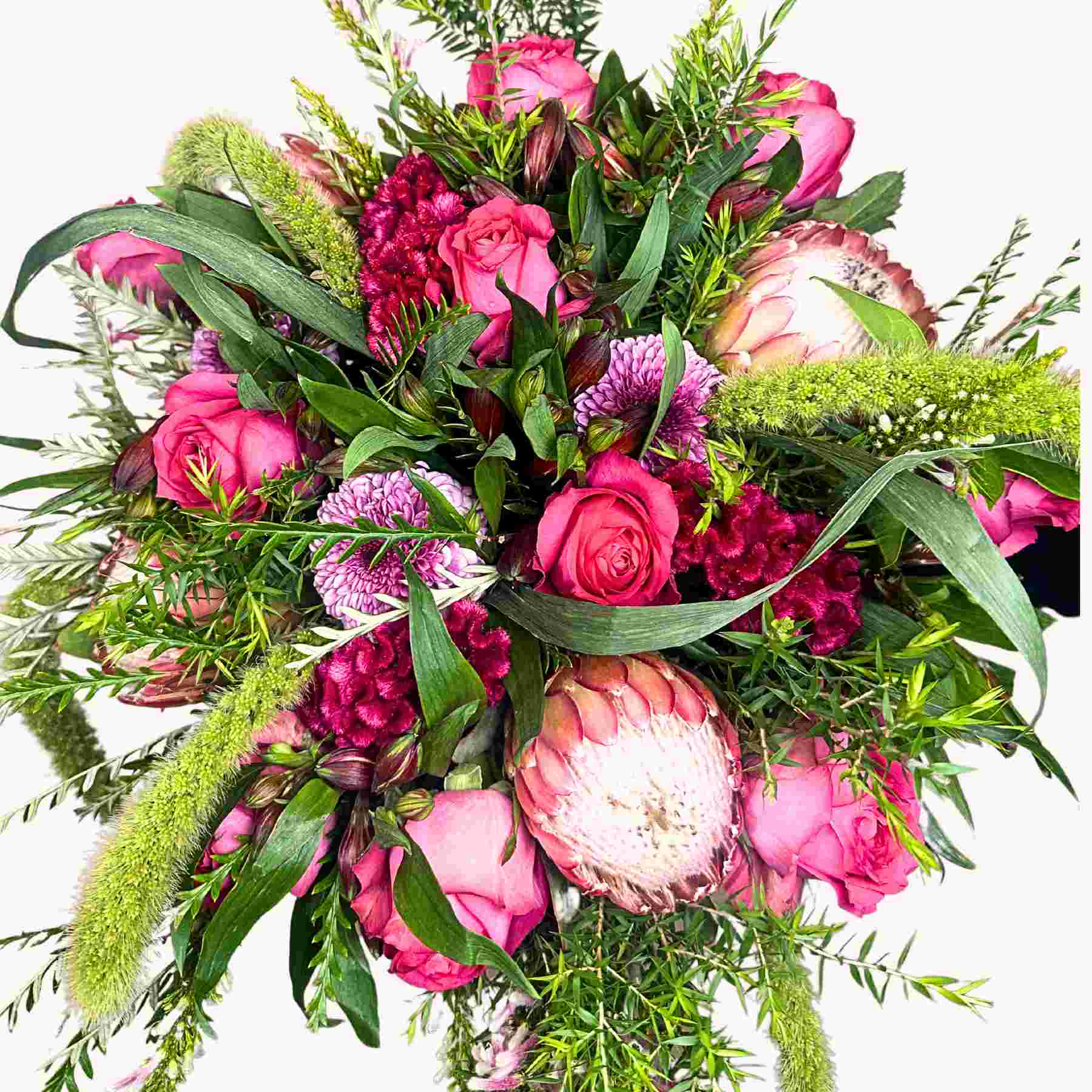 Close-up of Lily's Flower Bouquet featuring an exquisite mix of pink roses, proteas, and lush greenery, a perfect gift from Fabulous Flowers and Gifts.