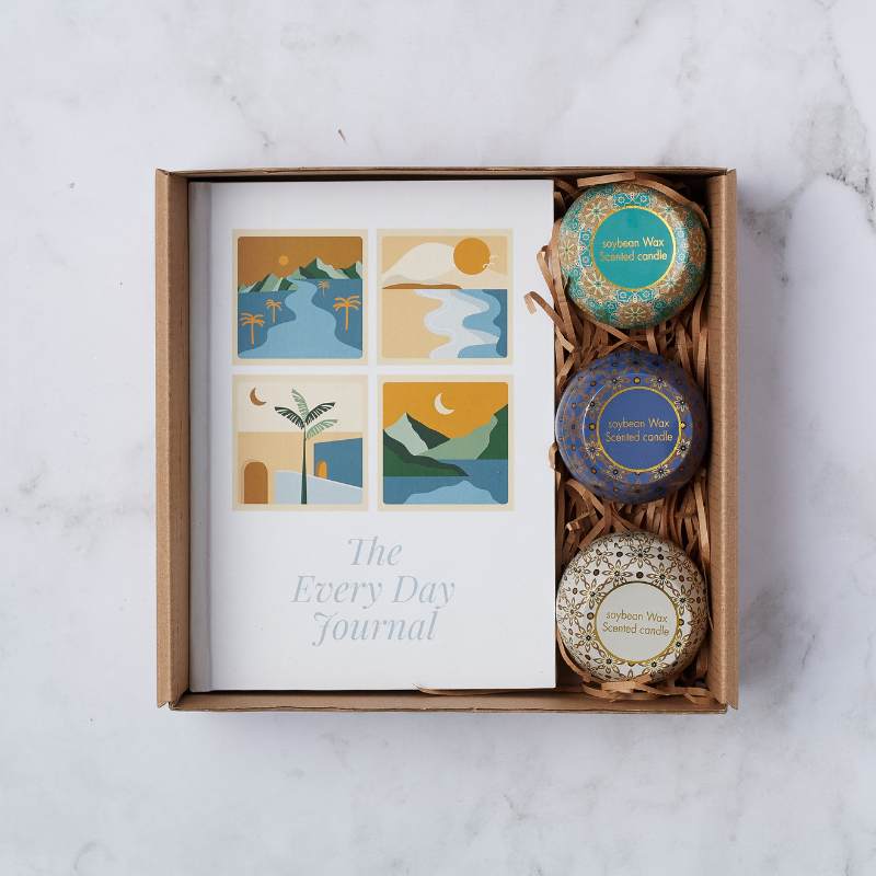 Loving Nurture Gift Set with The Every Day Journal and three scented soybean wax candles in decorative tins, beautifully presented.