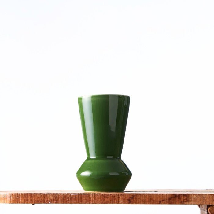 Sleek Lush Leaf Bud Vase in a vibrant green finish, featuring a modern, tapered design ideal for minimalistic decor.