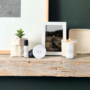 MOHAU Aromatherapy set with soothing products on a rustic wooden shelf, offered by Fabulous Flowers and Gifts for serenity and comfort.