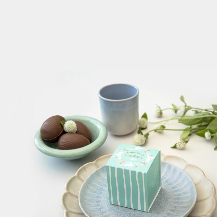 Mini Easter Box - Fabulous Flowers & Gifts pastel Easter box with chocolate eggs, cup and flower styling for seasonal gifting.