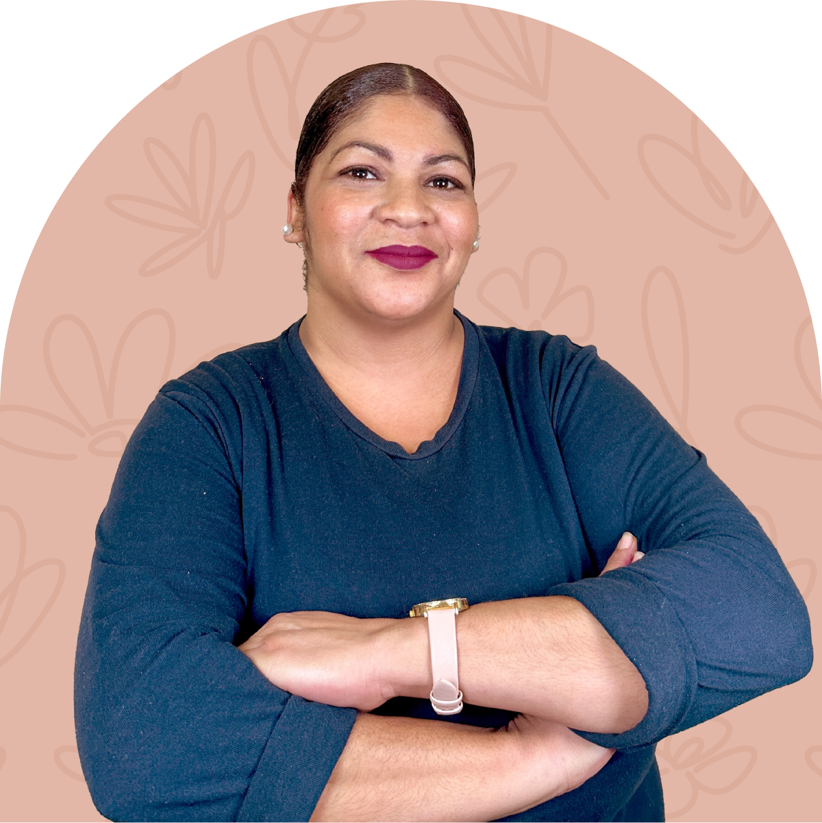 Portrait of Natasha, a dedicated team member at Fabulous Flowers for 9 years, with crossed arms and a confident smile. MEET THE TEAM at Fabulous Flowers and Gifts.