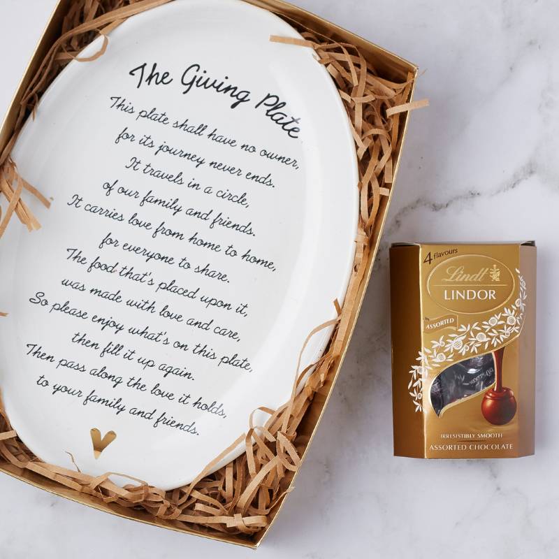 Close-up of The Giving Plate in the Pass the Love Gift Set, alongside Lindor chocolates, beautifully packaged for gifting.