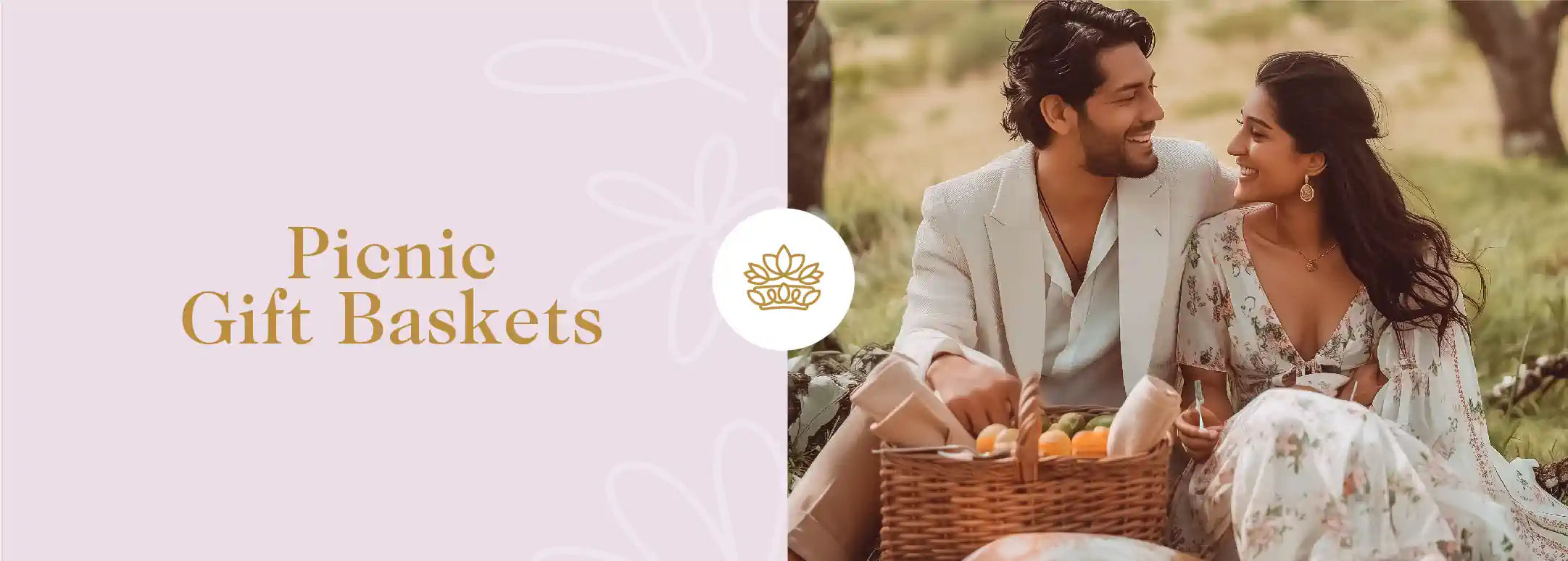 A couple enjoying a picnic with a basket of goodies, smiling at each other. Fabulous Flowers and Gifts - Picnic Gift Baskets