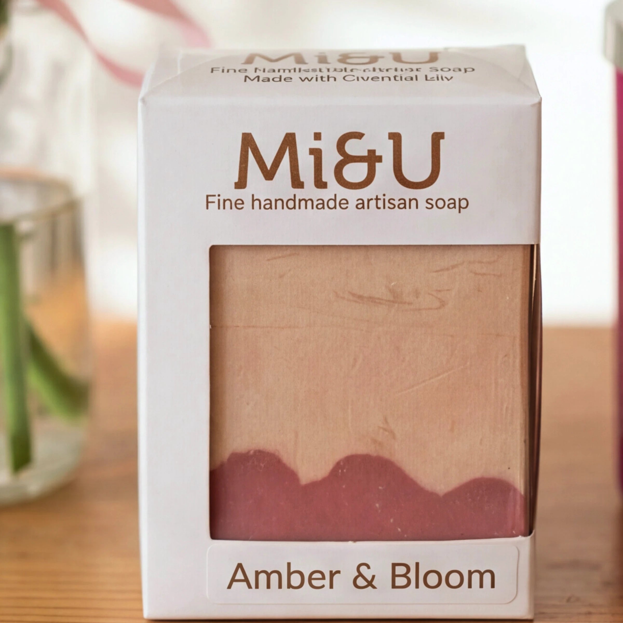 Close-up of the Mi&U Amber & Bloom artisan soap in the Rose & Ember gift set
