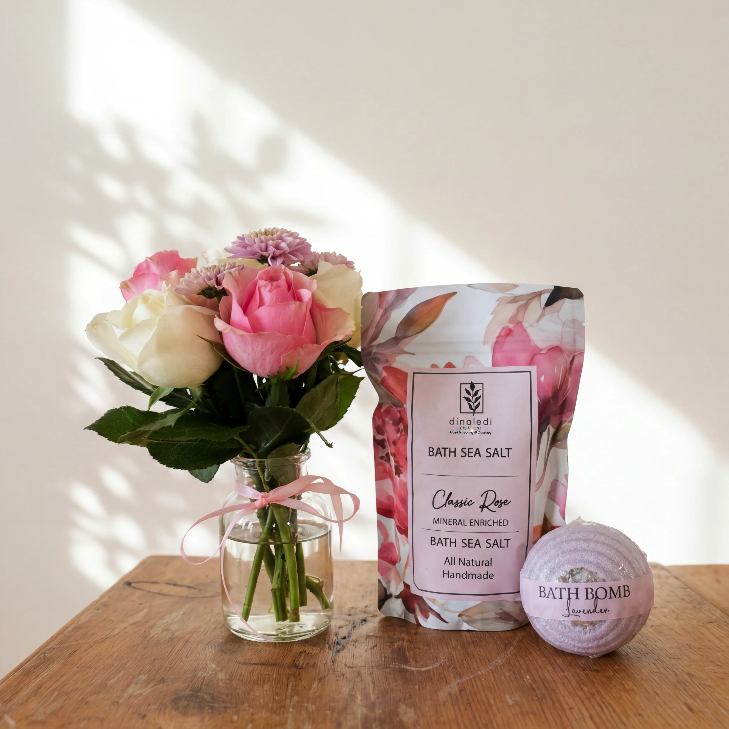 Rose & Repose spa gift set: pink and cream rose posy, Dinaledi rose bath salt and a lavender bath bomb