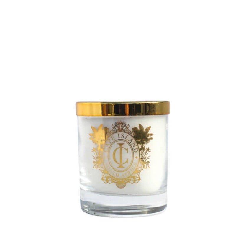 Glass candle with gold lid and logo on a white background