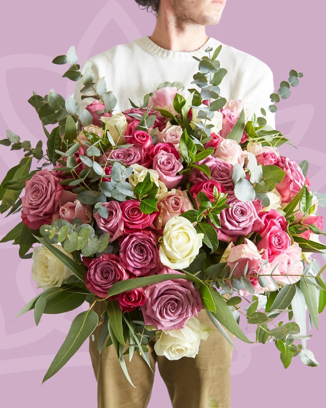 Birthday Flowers by Fabulous Flowers and Gifts – lush bouquet of pink, lavender, and cream roses with greenery
