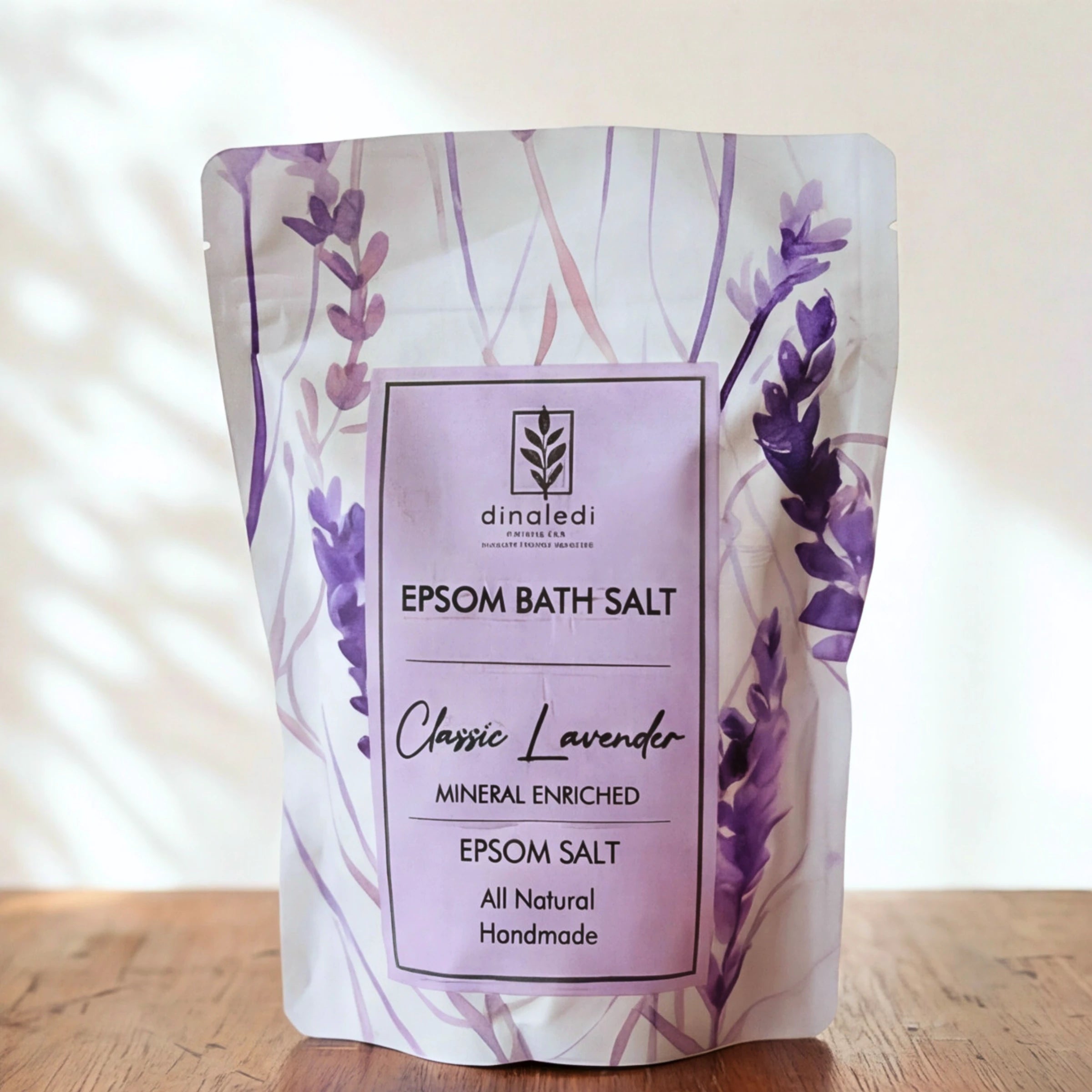 Close-up of the Dinaledi Classic Lavender Epsom bath salt pouch in the Soak & Soothe gift set