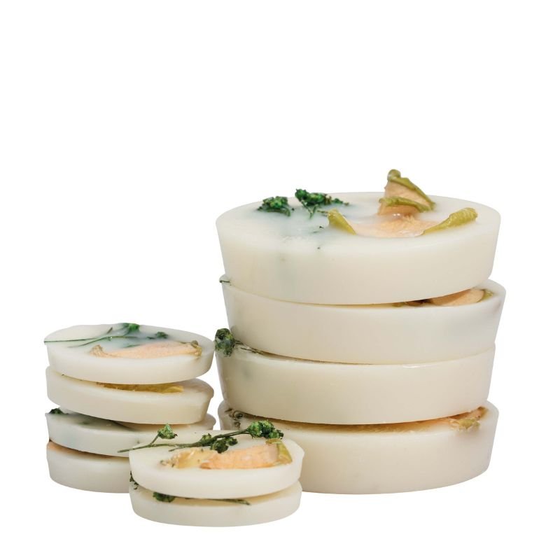Stack of layered appetizers with a white background