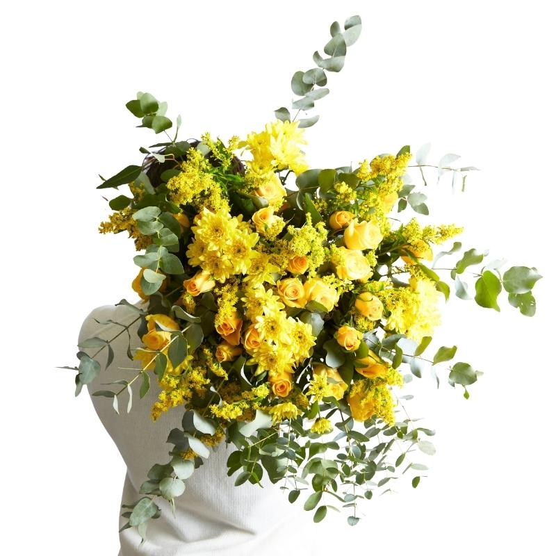 Sunkissed Yellow Bouquet on white background—bright yellow blooms with airy greens, hand-tied