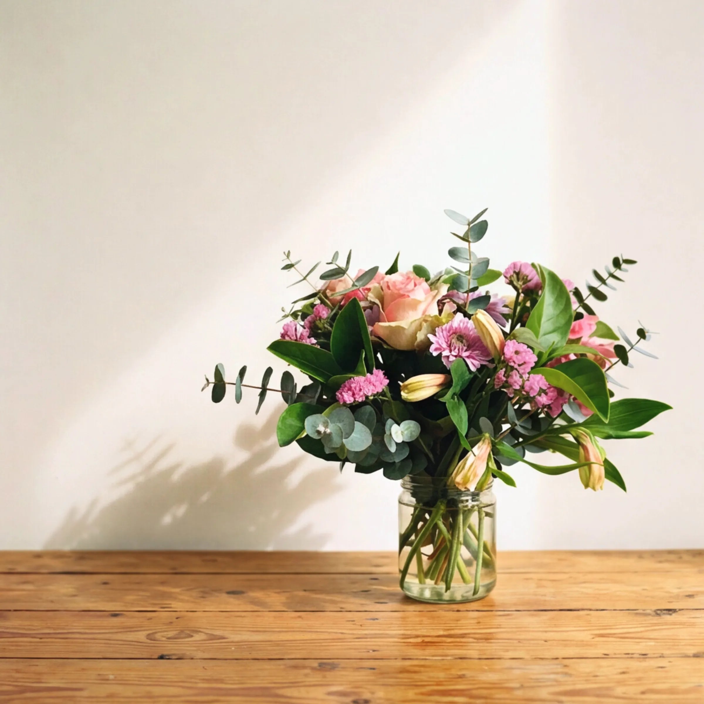 Sweet Pea in a Jar small fresh flower gift in a glass jar on a wooden table, hand-tied posy for same-day delivery