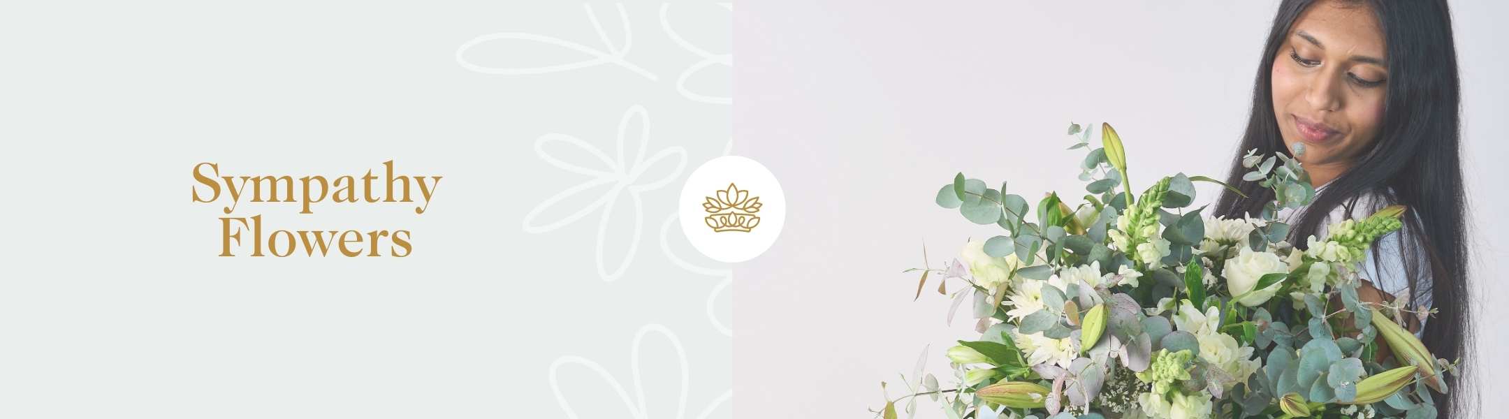 Sympathy Flowers by Fabulous Flowers and Gifts with a woman holding a green and white sympathy bouquet on soft background.