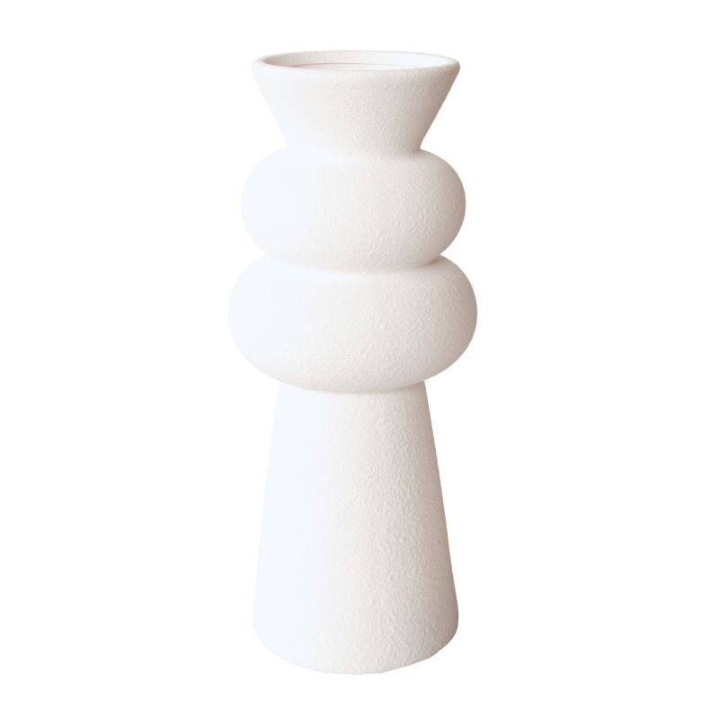 White ceramic vase with a modern design on a white background