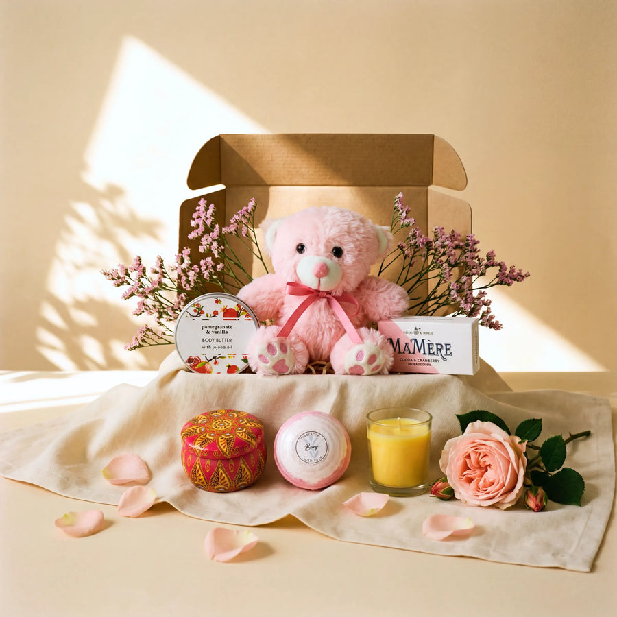 Teddy Comfort Care Box pink teddy bear, pomegranate vanilla body butter, candle and Mamere nougat by Fabulous Flowers