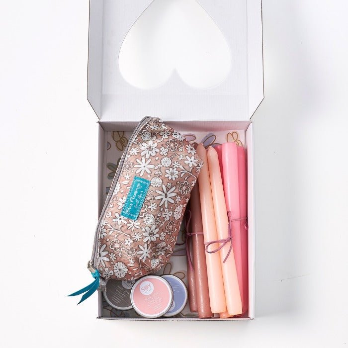 The Light She Gave - Fabulous Flowers & Gifts feminine gift box with pastel candles, skincare tins and floral essentials pouch.