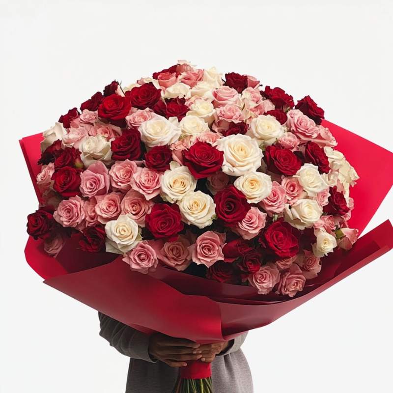 The "One and Only" bouquet features an opulent display of 500 roses in red, cerise, pink, and white, presented as an extraordinary large floral gift.