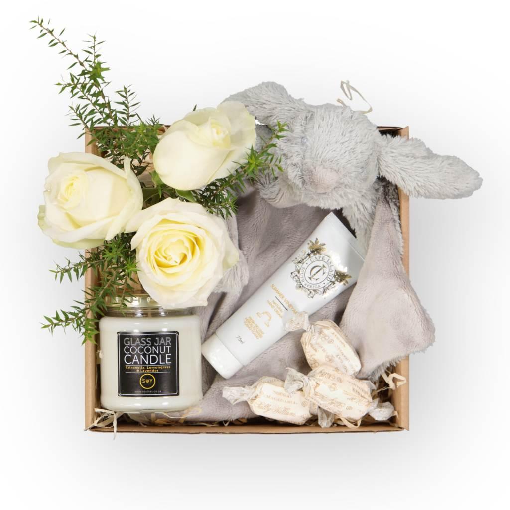 Luxury hand lotion inspired by Cape Winelands with a White roses arrangement in a glass jar with whimsical greenery - Fabulous Flowers