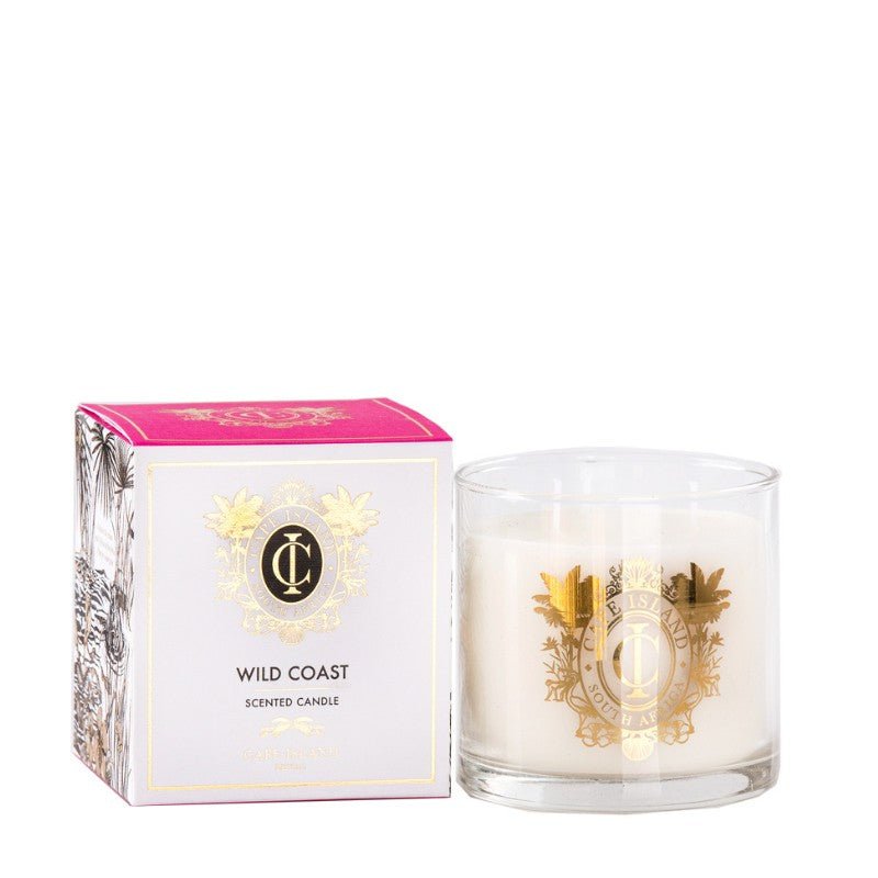 Scented candle with decorative design and matching box on a white background