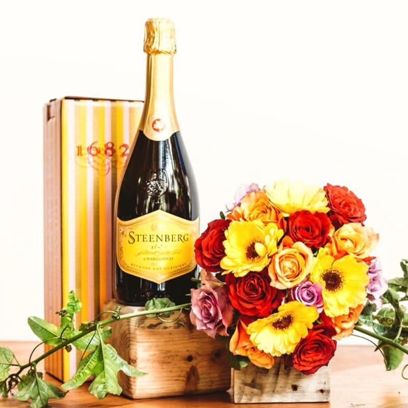 Classique Bouquet by Fabulous Flowers & Gifts – bold mixed blooms with Steenberg sparkling wine in a gift set for celebration