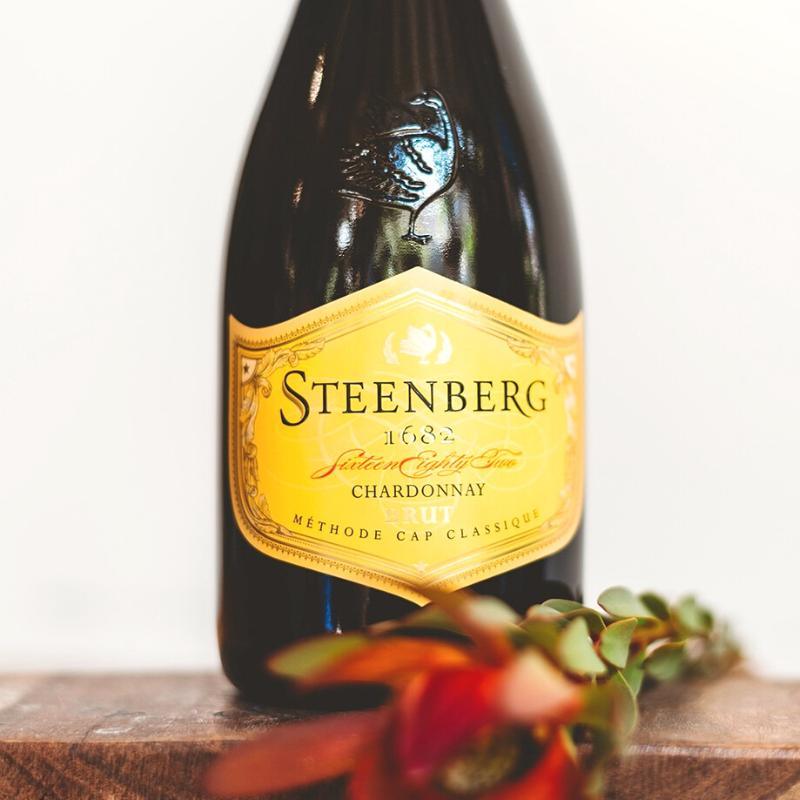 Close-up of Steenberg sparkling wine bottle – premium celebratory pairing for the Classique Bouquet by Fabulous Flowers & Gifts