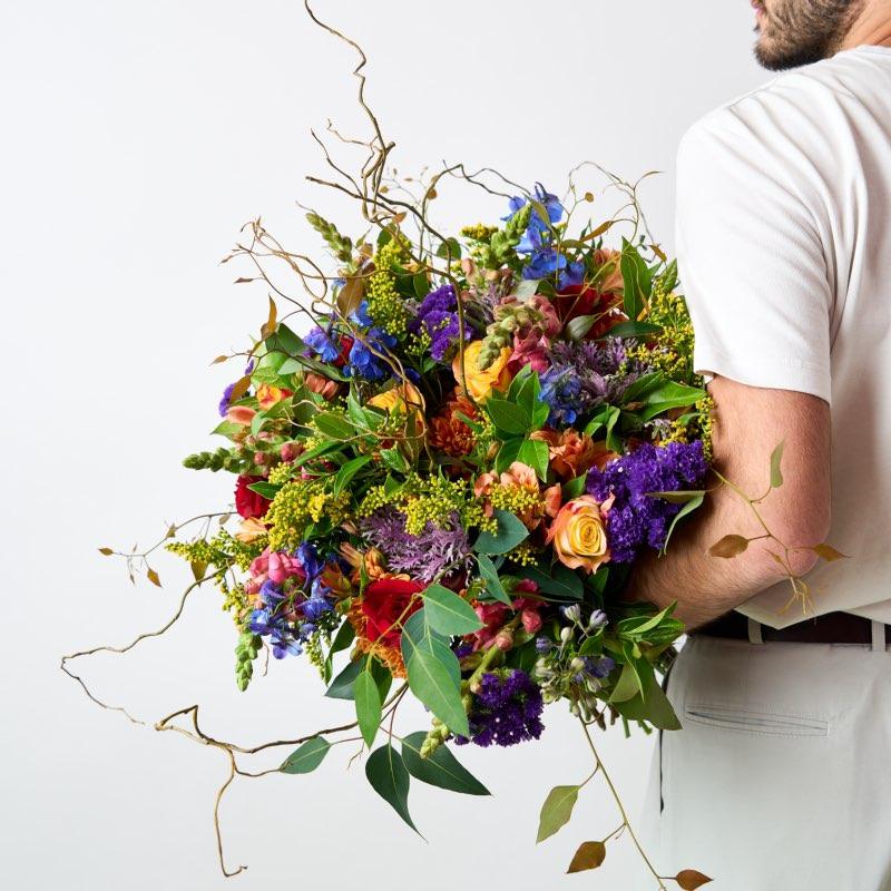 Bright bouquet of rainbow coloured flowers for celebratory occasions from Cape Town florist Fabulous Flowers