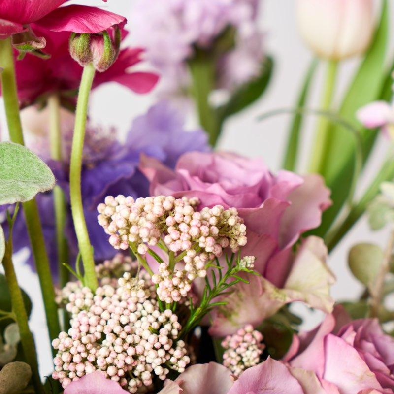 Rice flowers, roses and ranunculs in this gorgeous anniversary gift for her. Ranunculus represents charm in all of its forms. This gentle flower is a perfect way to say to someone that they are charming and that you are mesmerized by it. Delivered same day by Fabulous Flowers.