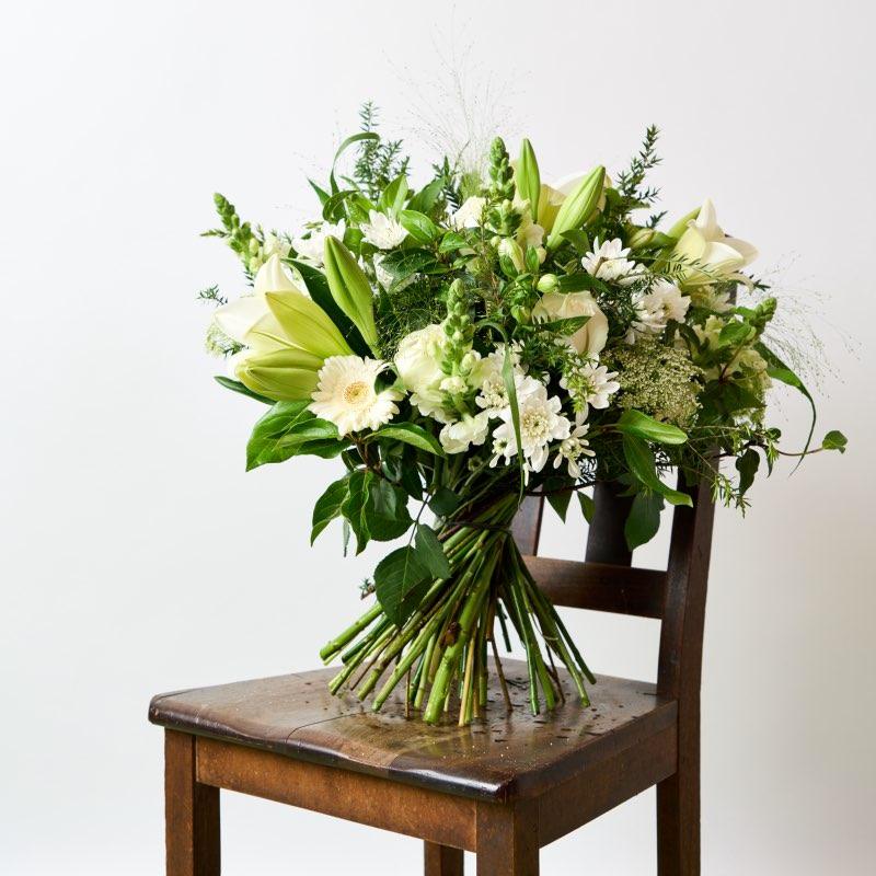The ingredients of this timeless classic include:  St Joseph Lilies Roses Gerberas Snapdragons Chrysanthemums Alstromeria Lace Rich greenery from Fabulous Flowers