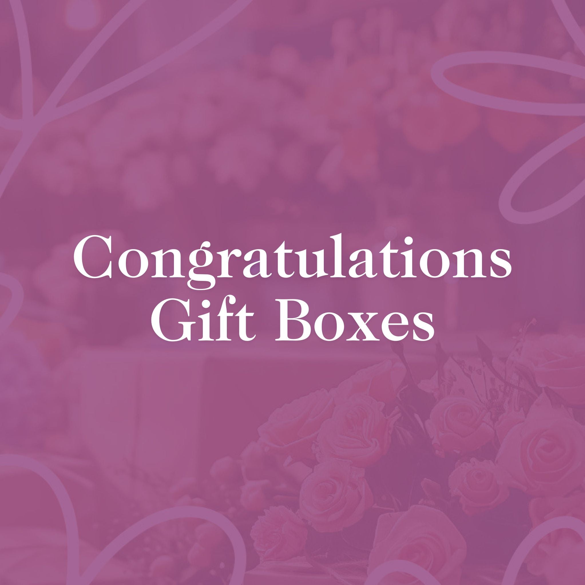 Assortment of unique congratulatory gift items in elegant packaging, part of the Congratulations Gift Boxes Collection by Fabulous Flowers and Gifts.
