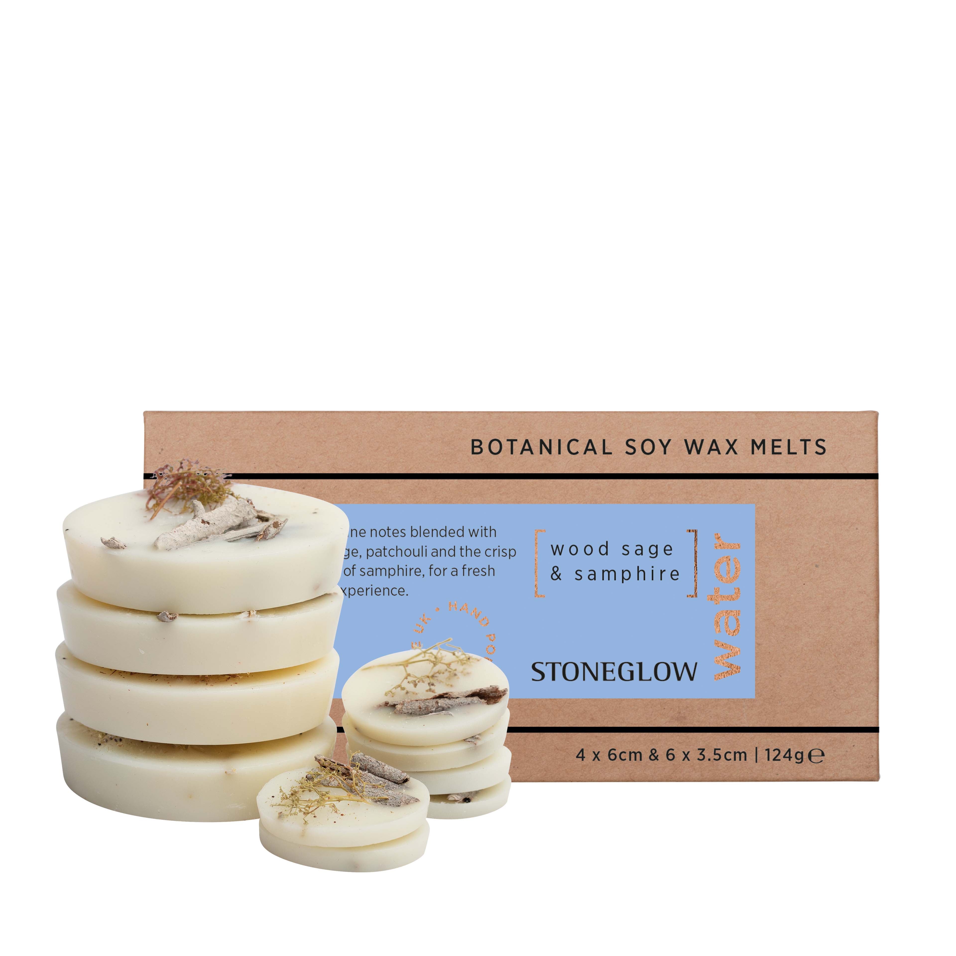 Stack of botanical soy wax melts with a cardboard box labeled 'Stoneglow' on a white background.